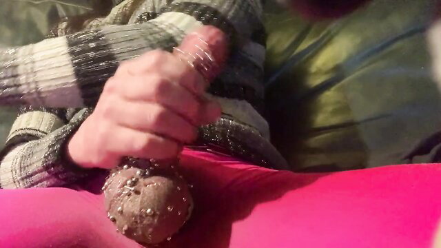 TSPierc polishes huge pierced cock with hands in sexy sweater