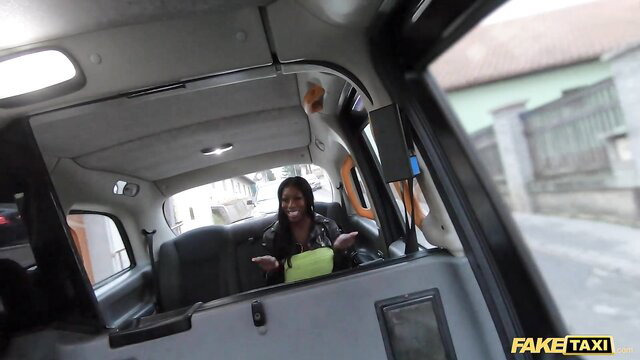 Ebony Mystique flashes XXL black tits and booty in Fake Taxi backseat