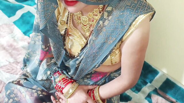 Cauple95 Indian beauty in sheer blue saree, gold jewelry, red lips closeup