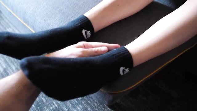 Hot girl in Nike socks gets foot massage from guy in teasing thumbnail