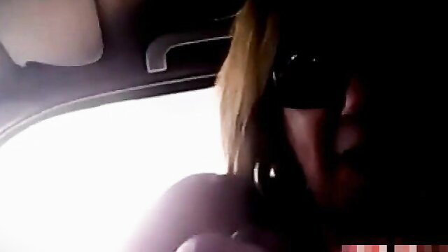 Blonde aunt in shades touches flashing dick in car POV