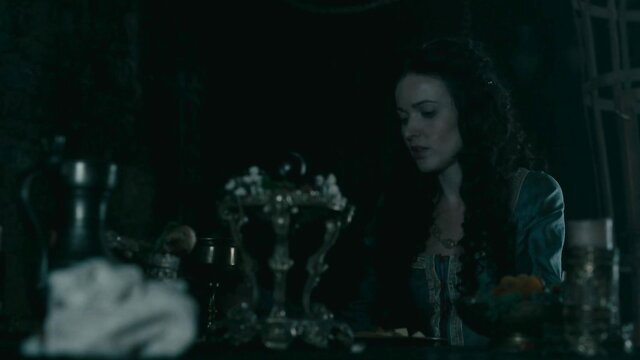 Karen Hassan as Therese in Vikings, curvy brunette in sexy dress closeup