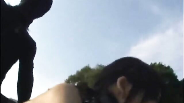 Japanese girl POV riding dildo machine outdoors race cars