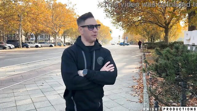 Curvy German MILF with huge tits in black hoodie on sunny street