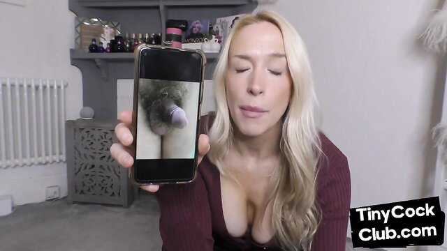 Big titted blonde CFNM domina mocks tiny cock pic on phone