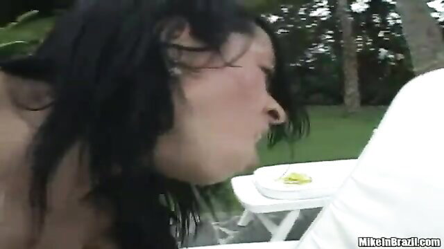 Brunette with big tits outdoor blowjob on handsome guy's cock