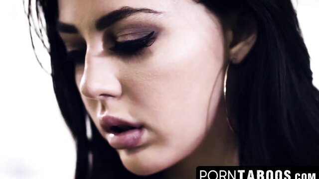 Hot brunette stepdaughter with glossy lips closeup gaze