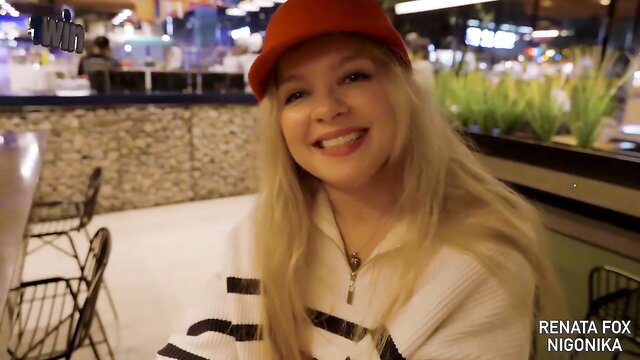 Renata Fox smiling in red cap and striped hoodie, Nigonika porn star