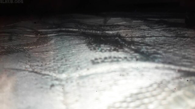 Blurry close-up of woman's cleavage in low light, neighbor teacher teases