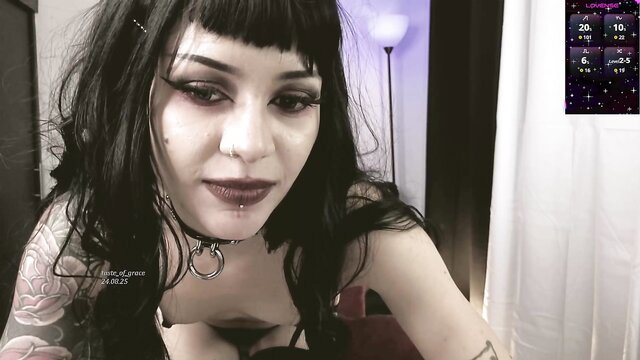 Goth model taste_of_grace in choker, heavy makeup, topless tease