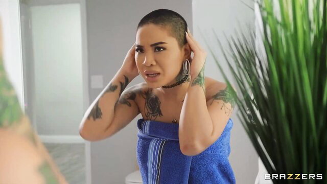 Honey Gold in towel, shaved head, tattoos, bathroom tease