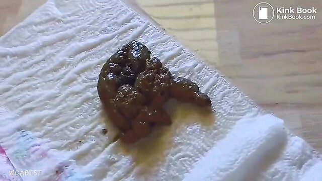 Sexy girl fresh scat poop pile on white diaper in extreme fetish video