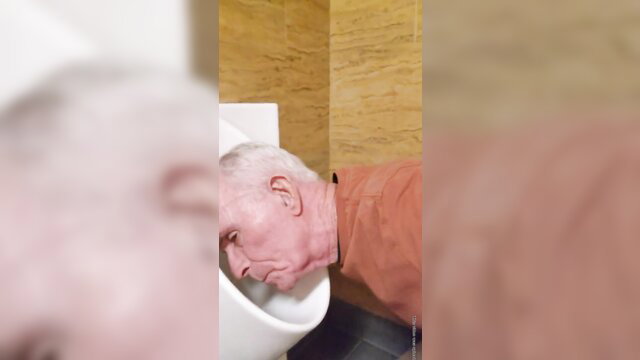 Old man licks public urinal clean in extreme piss fetish video