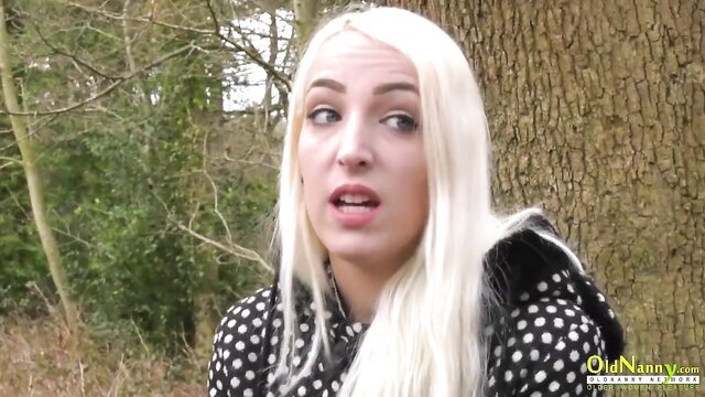 Blonde in polka dot hoodie shocked outdoors woods lesbian party tease