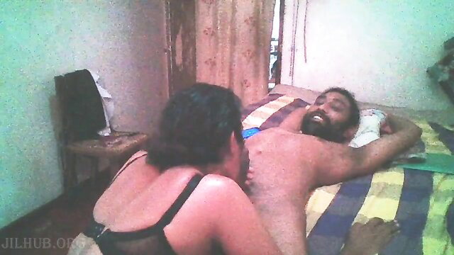 Hijab lady in lingerie seduces naked man on bed in amateur home video
