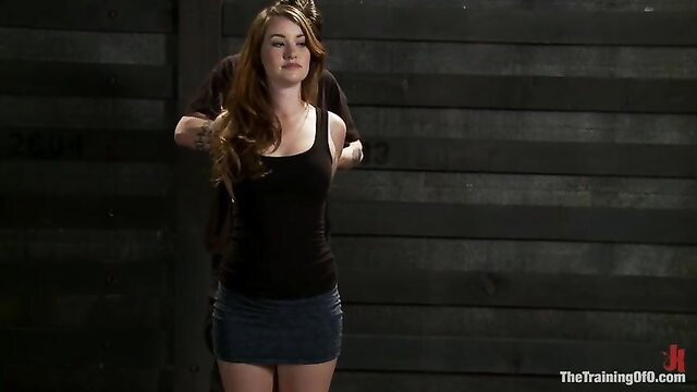 Sophia Lauryn first timer in bondage, arms bound behind back teasingly