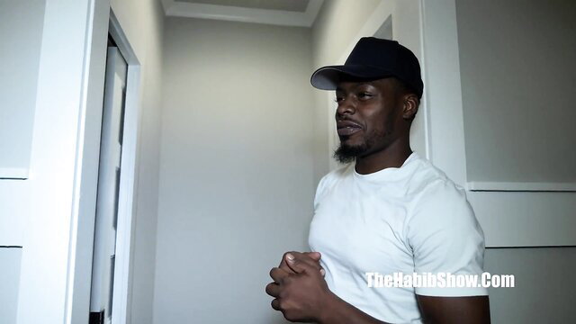 Devin Drills in tight white tee, hallway stance, Maria Bose big booty star