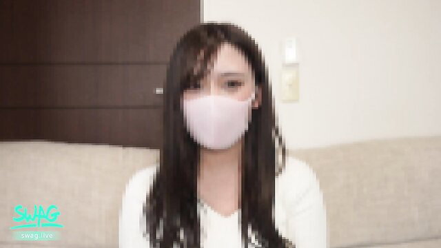Asian beauty in white top and pink mask, long dark hair, teasing amateur JAV thumbnail