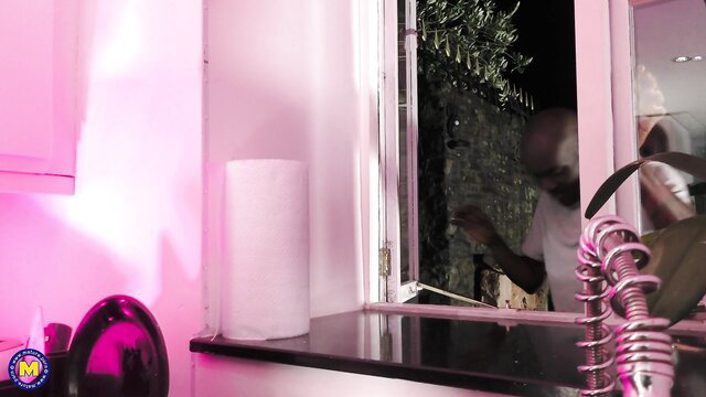 Blurry reflection of a man in a window