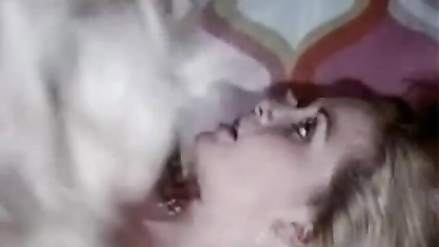 Vintage blonde bombshell with hungry wet lips in steamy close-up oral scene