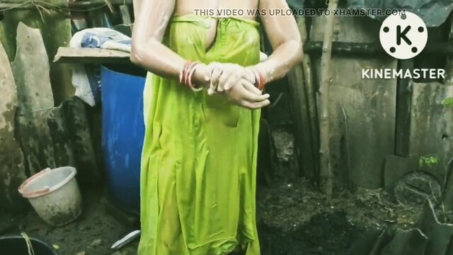 Tamil village mullu aunty wet saree outdoors bath tease
