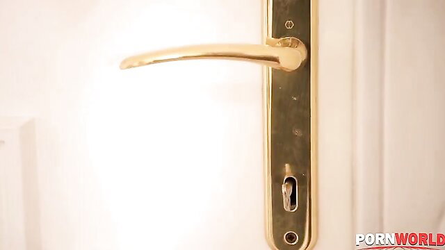 Venus Afrodita's gold door handle tease in naughty nurse scene