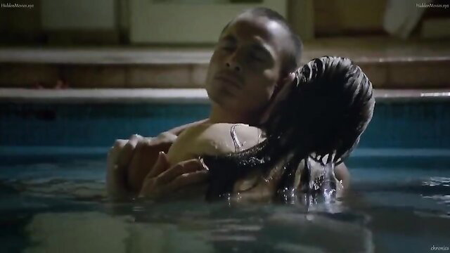 Lovi Poe wet topless embrace in pool from The Escort (2016)