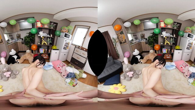 Nude Asian woman with big tits lounging naked on floor surrounded by plush toys VR view