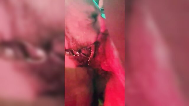 Closeup of woman's gagged open mouth in Good Boy Whitehead Gag fetish scene