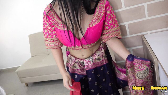 Desi MILF in pink embroidered saree blouse, deep cleavage tease