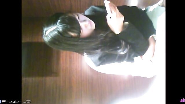 Asian spy officer girl squatting peeing on floor caught on hidden cam