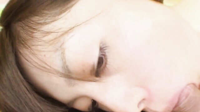 Closeup of real hairy Japanese teenie's face in erotic ecstasy