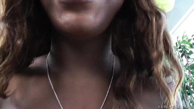 Curly-haired black shemale China closeup neck and lips
