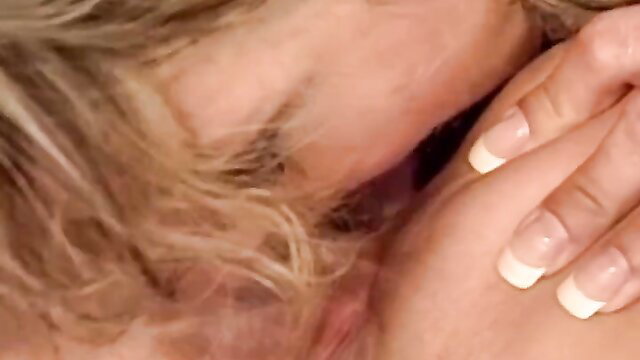 Blonde woman neck kissed passionately closeup