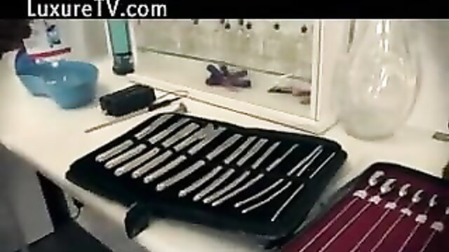 Sounding Collection 99: Array of urethral sounds on tray for cock sounding play