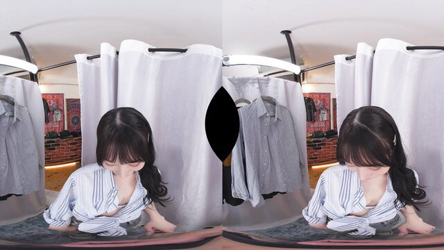 Asian babe in open blouse trying on jeans in store fitting room VR