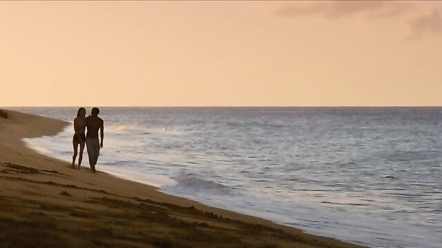 Camille Rowe nude beach walk silhouette at sunset in No Limit (2022)