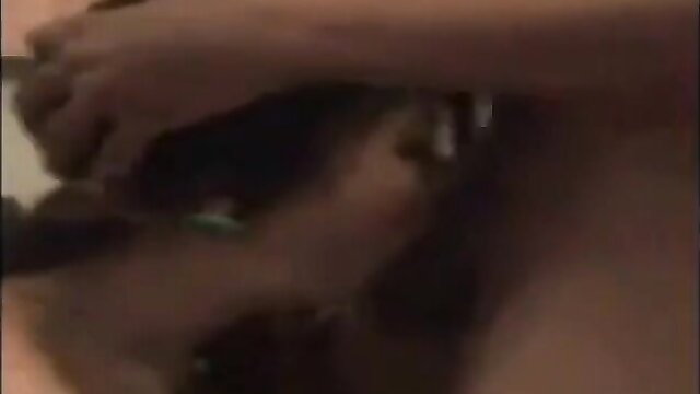 Closeup of brunette woman giving intense blowjob in hardcore scene