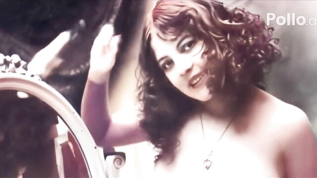 Vintage lesbian MILF with curly hair poses nude before mirror