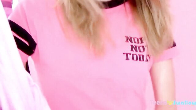 Hannah Hays in pink 'No No Today' crop top, teasing smile