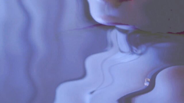 Korina Kova closeup lips and neck in erotic purple haze
