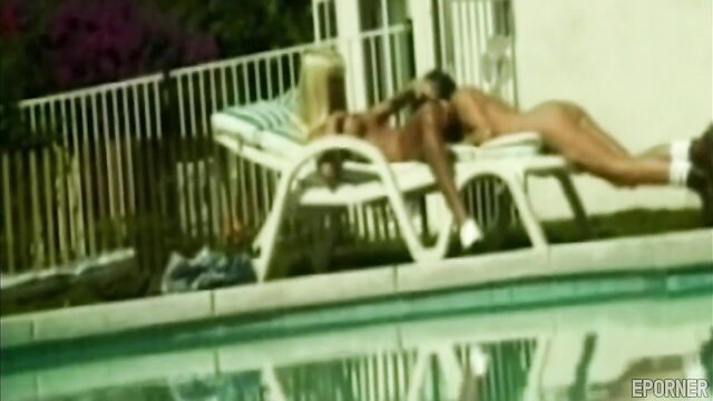 Two nude retro lesbians lounging hot by pool outdoor sex
