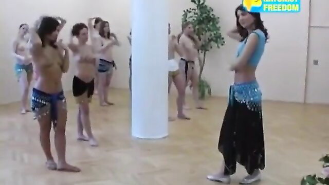 Nude Asian women belly dancing topless in group lesson