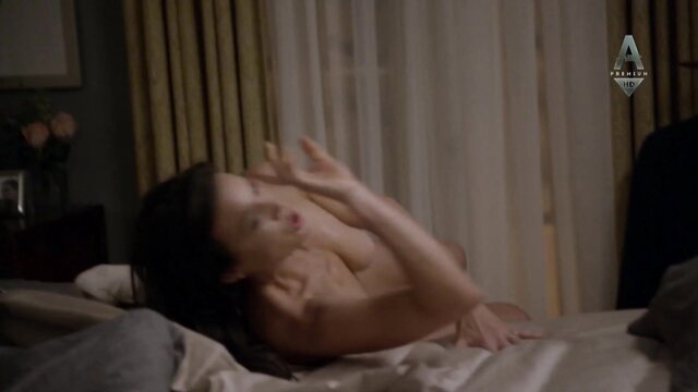 Carla Gugino nude in bed, topless side pose from The Brink S01