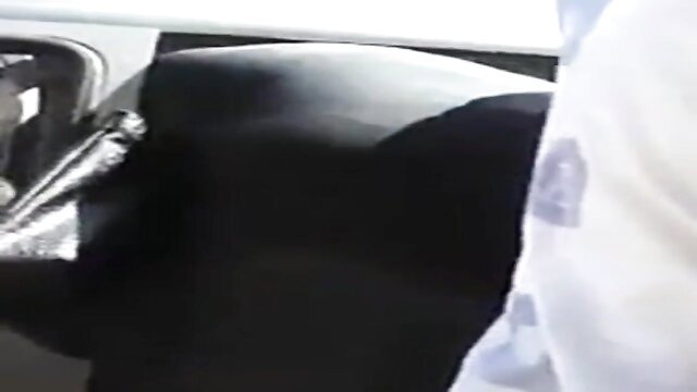 Middle Eastern woman in a car