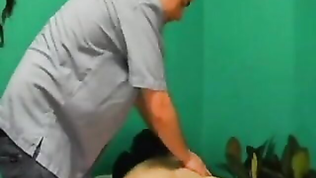 Man massaging woman's nude ass in erotic massage orgasm technique