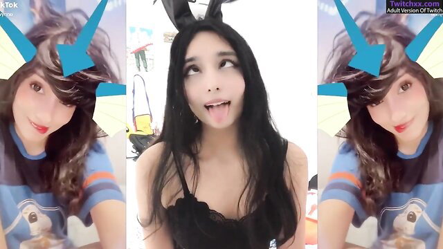 Asian bunny girl cosplay streamer with black hair, tongue out, sexy lingerie tease