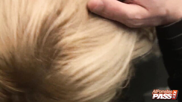 Blonde Stacey closeup with hand on head in hot office tease