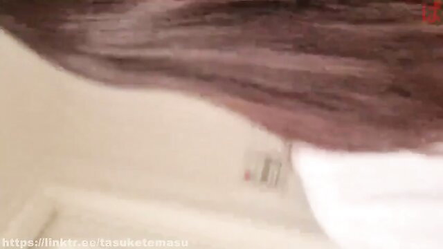 Cute Japanese girl with long brown hair in white top, close-up portrait