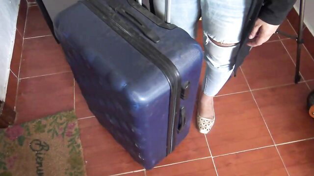 Hottie Souzan Halabi in ripped jeans by blue suitcase, amateur tease